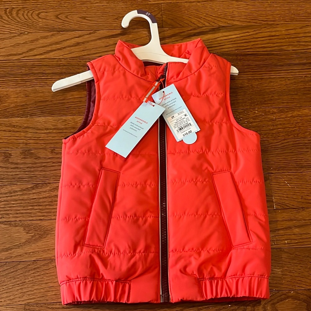Red cat and Jack vest.  Never worn.